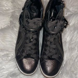 Michael Kors size 8.5 bronze high top sneaker.